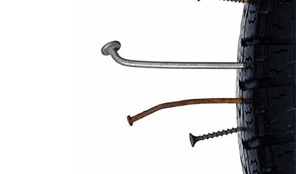 ACS Leaks Blog Image - Tire with Nails and Screws