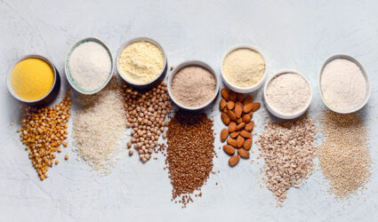 Grains and Health Foods in Jars and distributed on a table