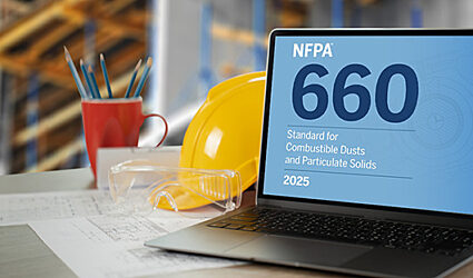 Engineers desk with screen showing NFPA 660.