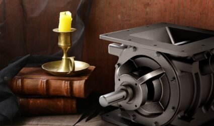 Rotary valve on a spooky backdrop with books and candle