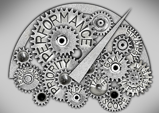 Gears and machine parts with words related to efficiency