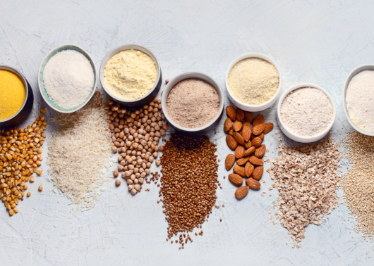 Grains and Health Foods in Jars and distributed on a table