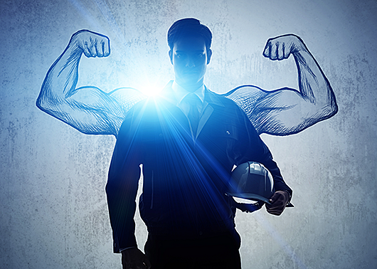 Worker with a hard-hat and uniform with cartoon muscle arms drawn in the background