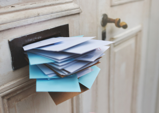 Mail Slot full of Letters