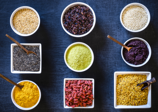 Different healthy grain foods in bowls