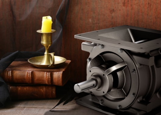 Rotary valve on a spooky backdrop with books and candle