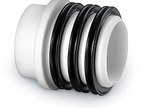 Sleeve-style shaft seal for rotary airlock valves