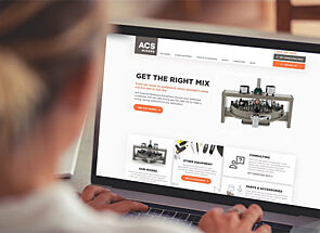 Person looking at ACS Mixers Website on Laptop