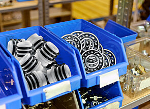 Blue bins filled with spare parts