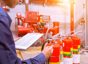 Inspector checking for fire safety and NFPA compliance