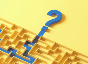 Blue line running through a yellow labyrinth with a question mark at the end