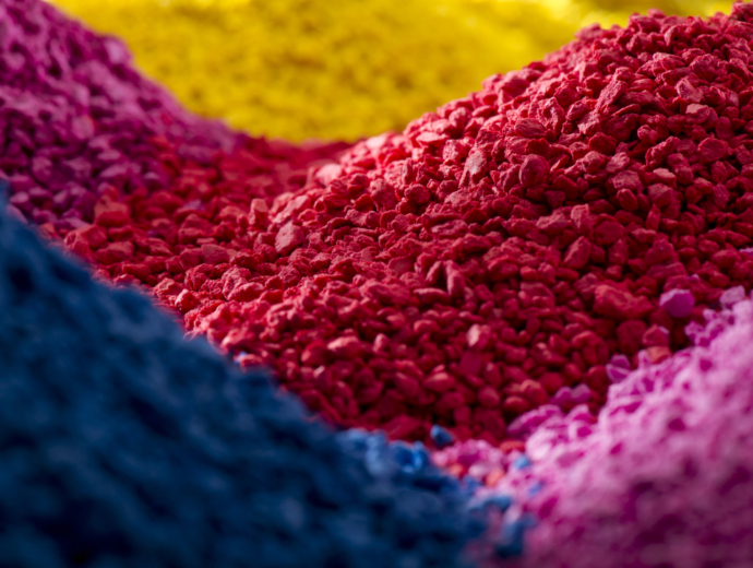 Magenta, Yellow, Red, Blue piles of ingredients for chemical industry processing